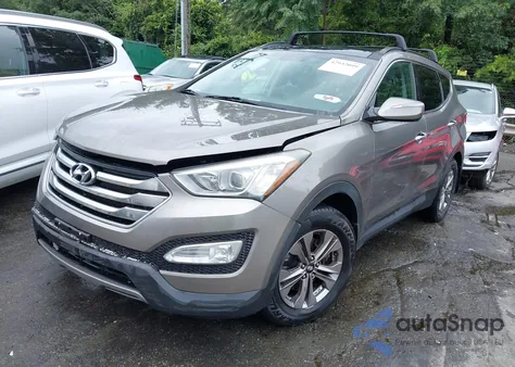 2015 Hyundai Santa Fe Sport 2.4L z USA, uszkodzony, nr VIN 5XYZUDLBXFG255449